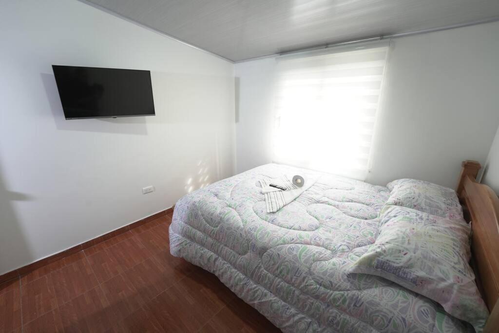 Casa 2 Pisos con WIFI para máximo 17 Huespedes a 5 min del centro