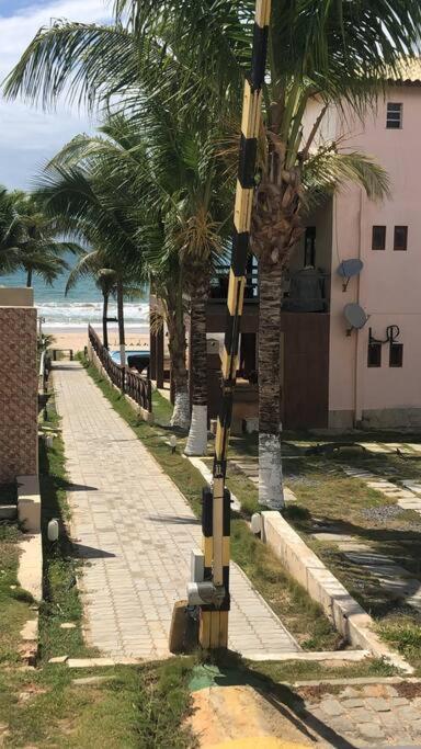 Casa de praia, com piscina, em frente a praia, pé na areia