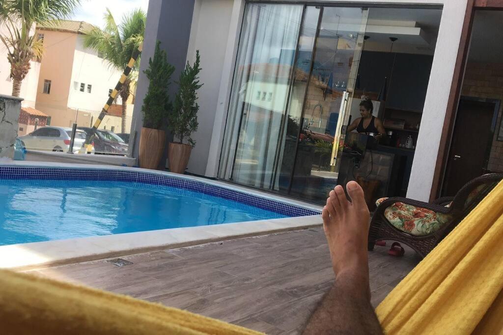 Casa de praia, com piscina, em frente a praia, pé na areia