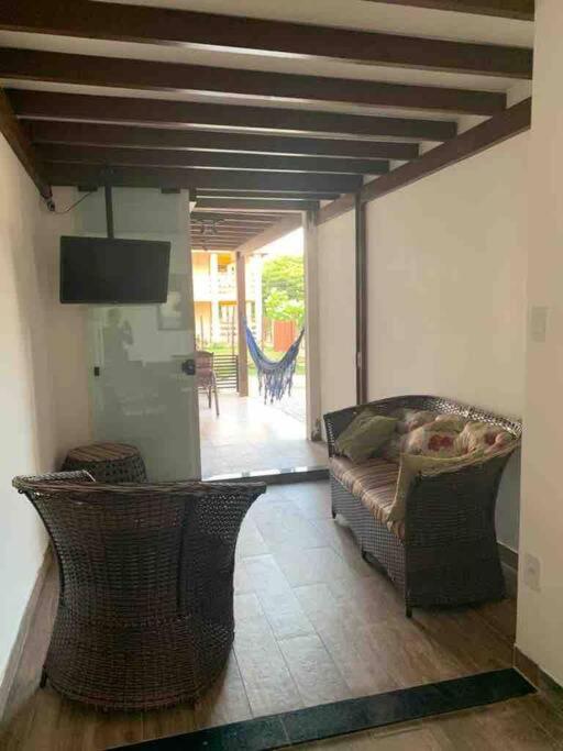 Casa de praia, com piscina, em frente a praia, pé na areia