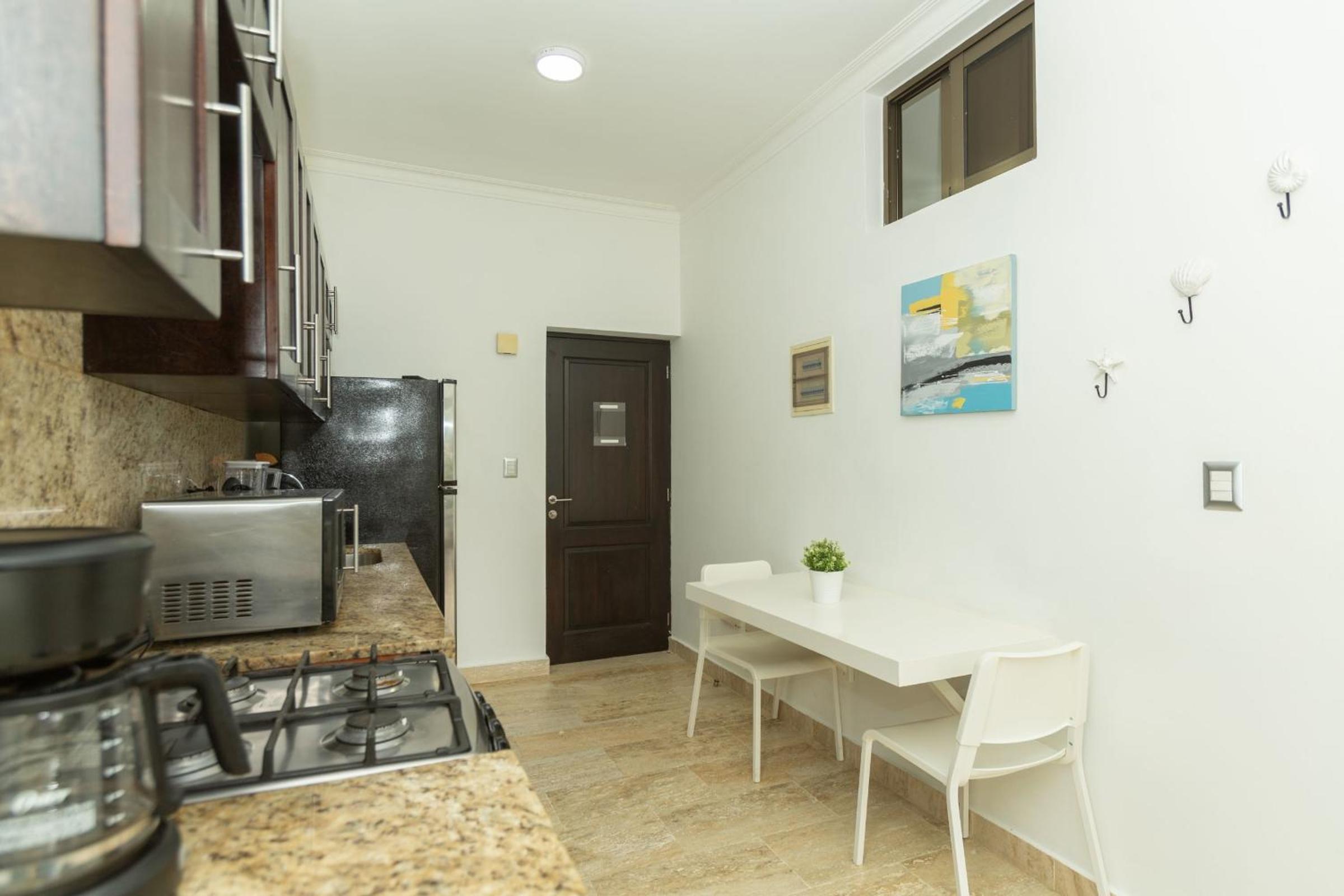 Charming Beachfront Apartment with Terrace