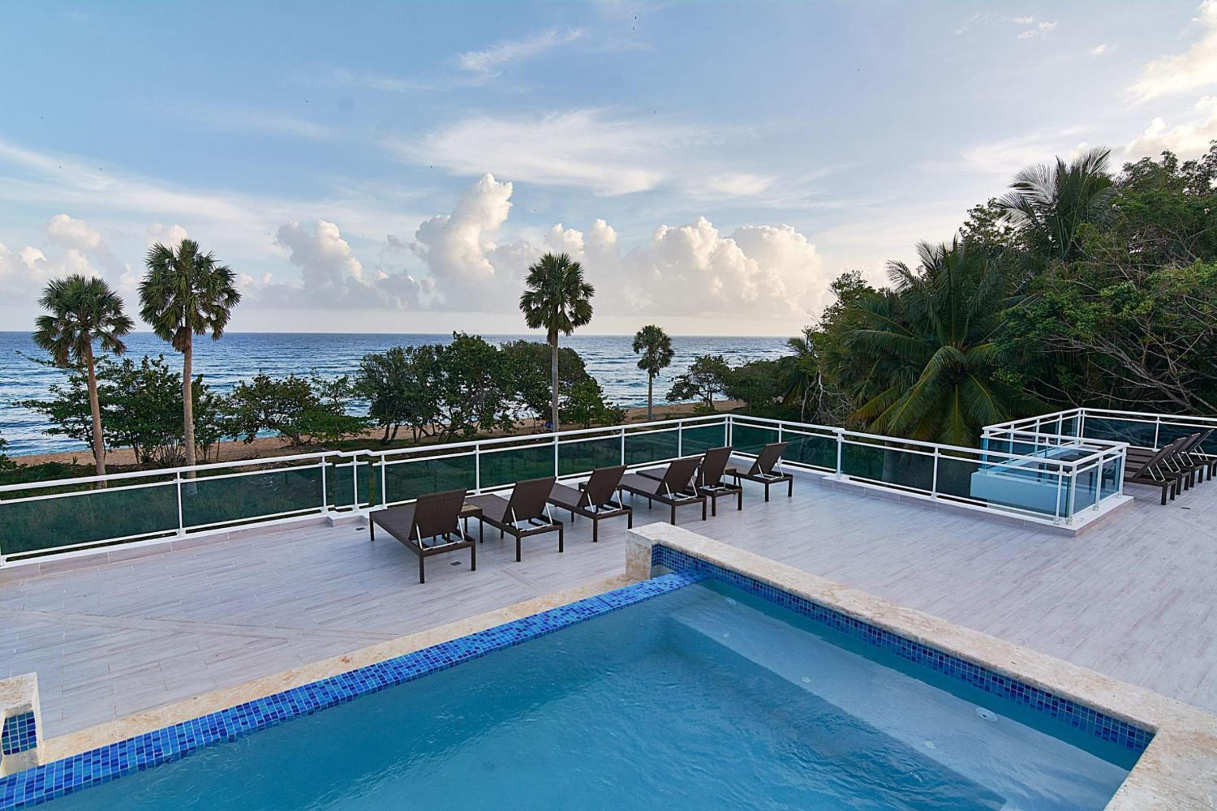 Charming Beachfront Apartment with Terrace
