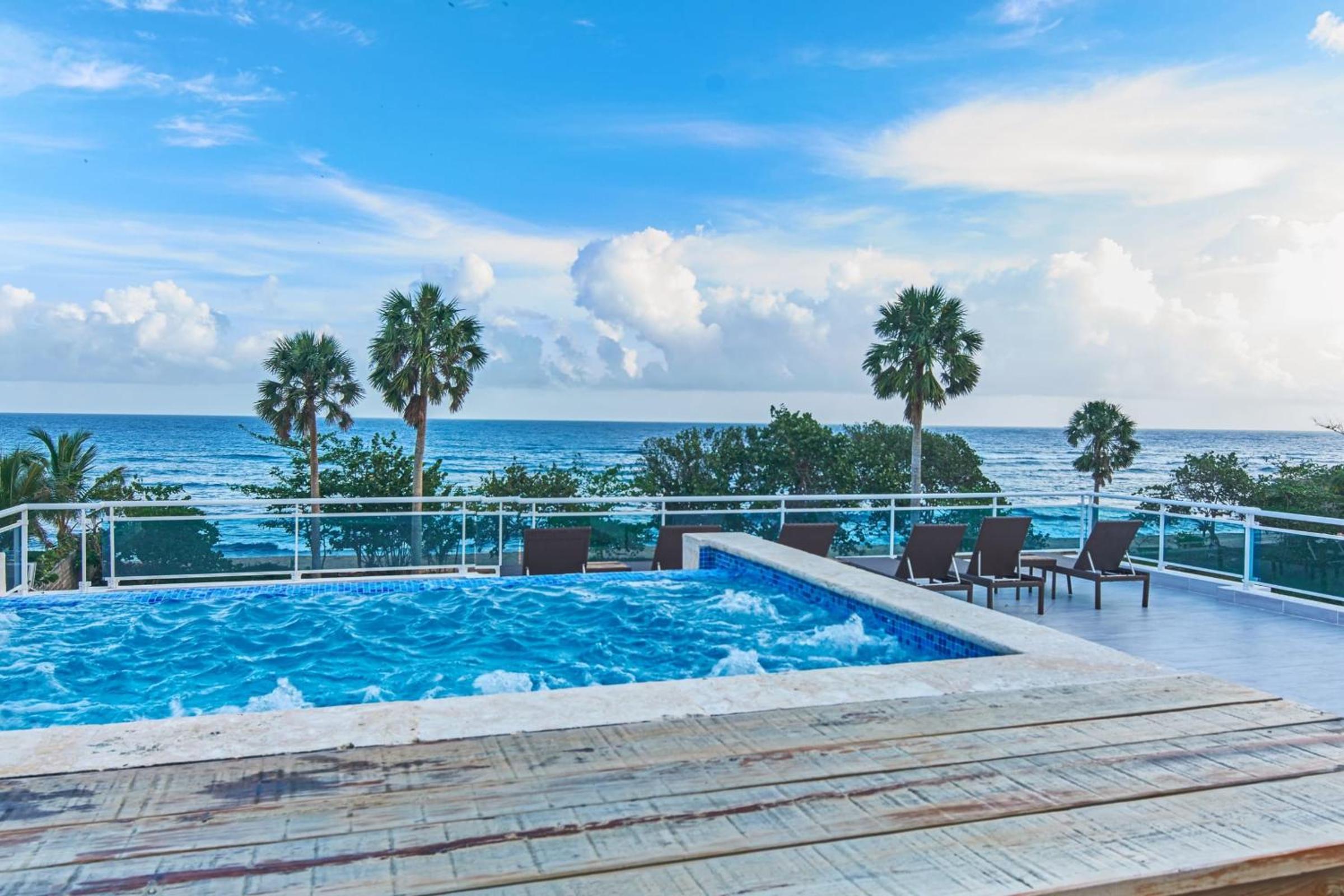 Charming Beachfront Apartment with Terrace