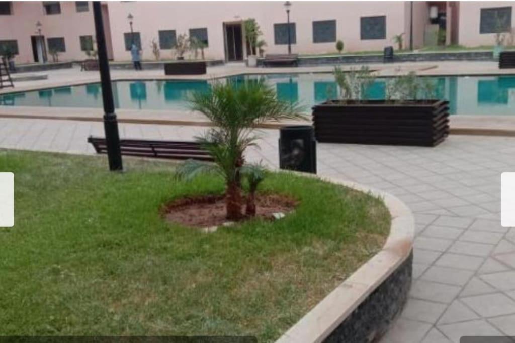 Apartement bien meublé piscine salle de sport view 2