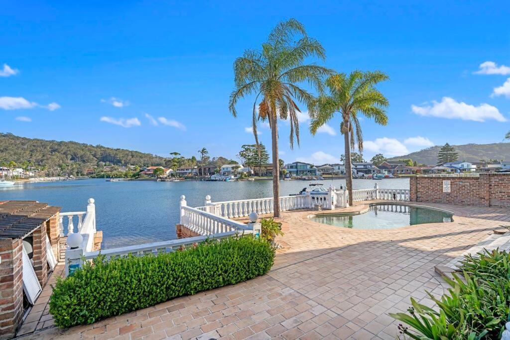 Stunning 4BR Holiday Home with Water Views & Pool