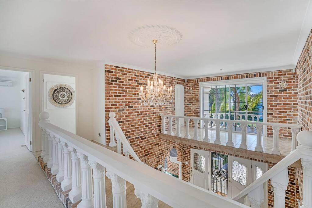 Stunning 4BR Holiday Home with Water Views & Pool