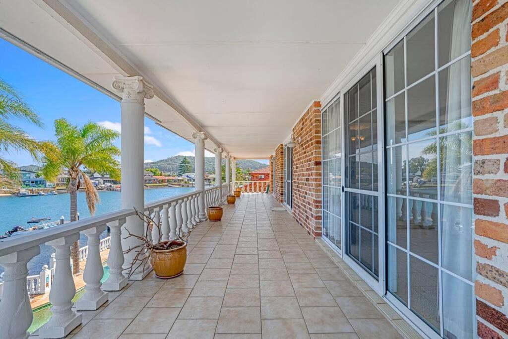 Stunning 4BR Holiday Home with Water Views & Pool