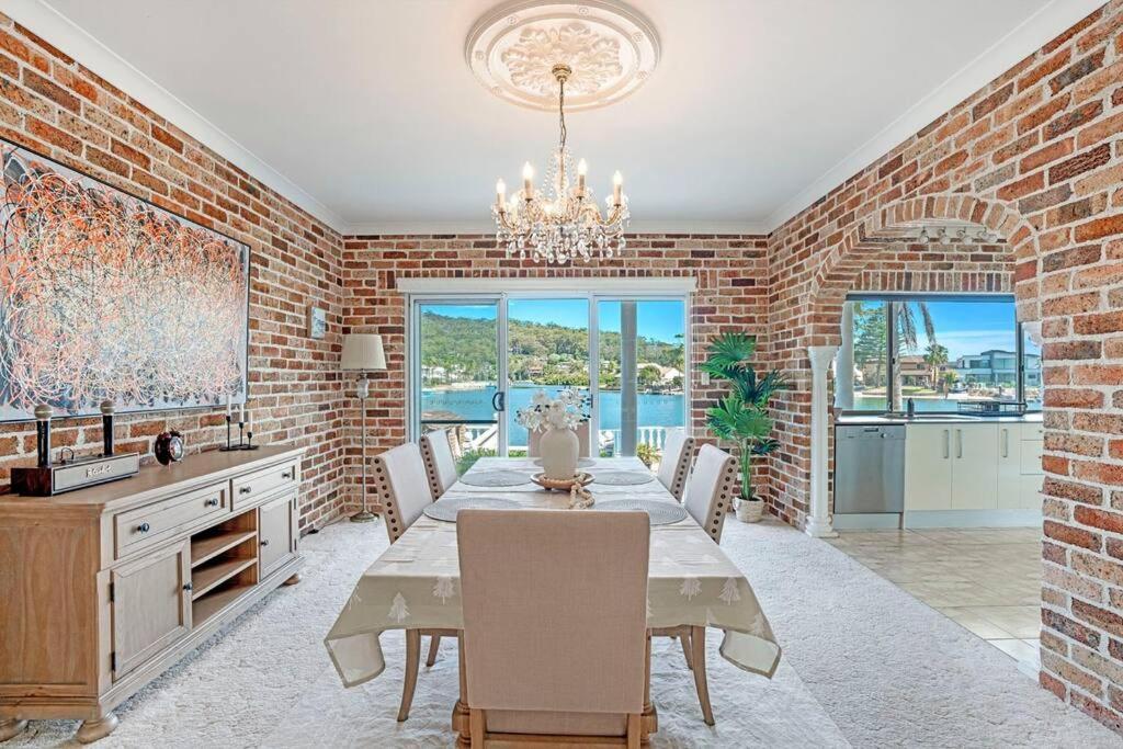 Stunning 4BR Holiday Home with Water Views & Pool