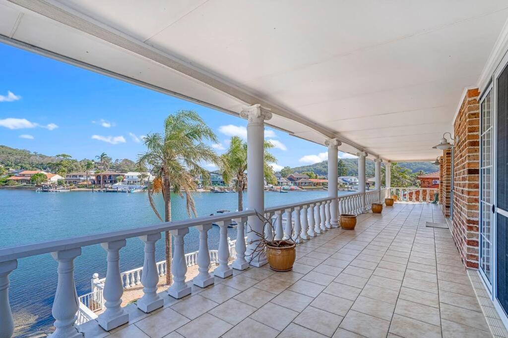 Stunning 4BR Holiday Home with Water Views & Pool
