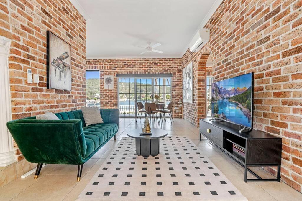 Stunning 4BR Holiday Home with Water Views & Pool