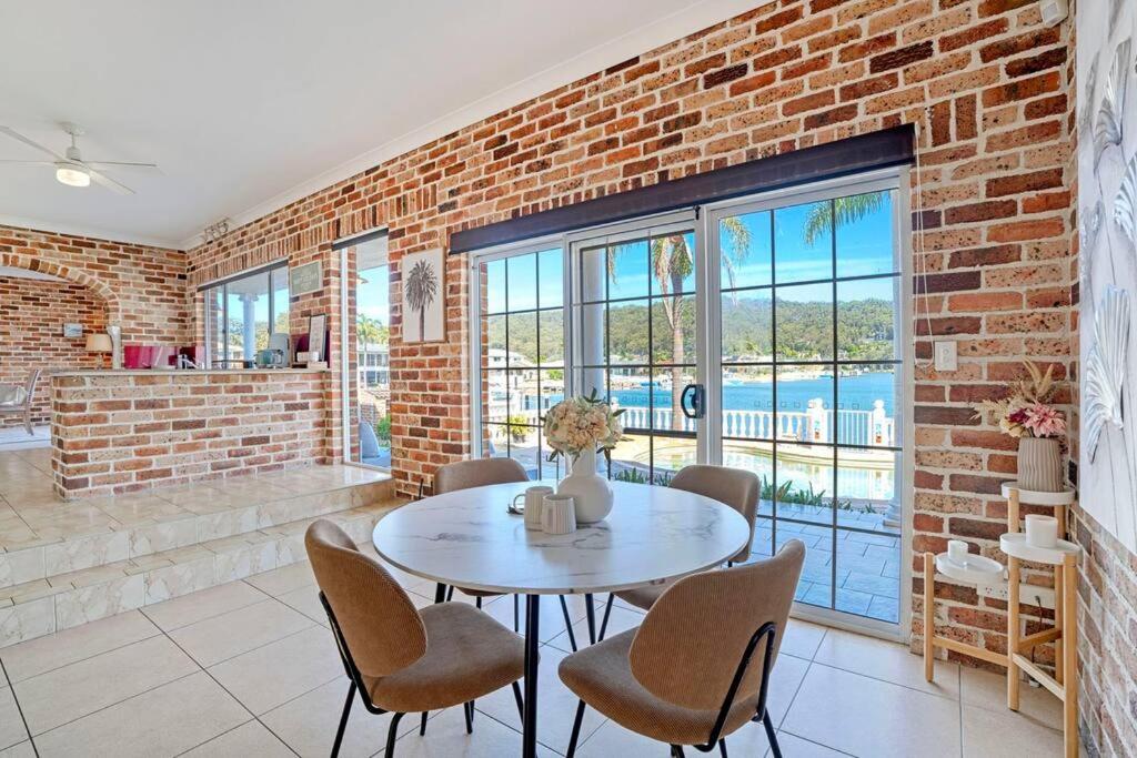 Stunning 4BR Holiday Home with Water Views & Pool