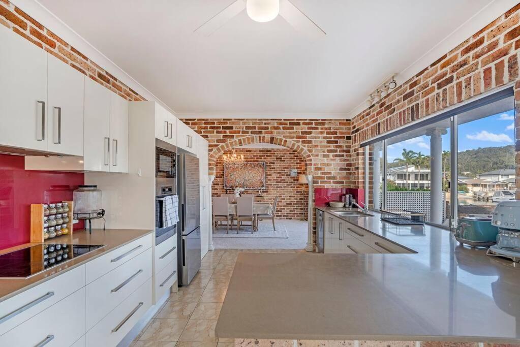 Stunning 4BR Holiday Home with Water Views & Pool