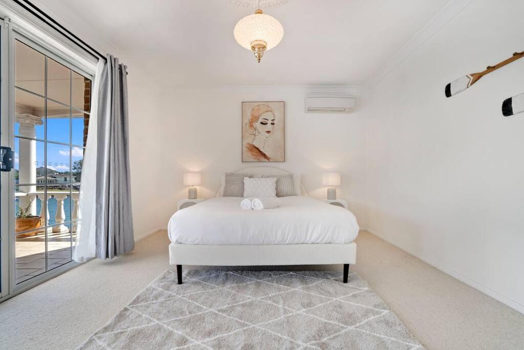 Stunning 4BR Holiday Home with Water Views & Pool