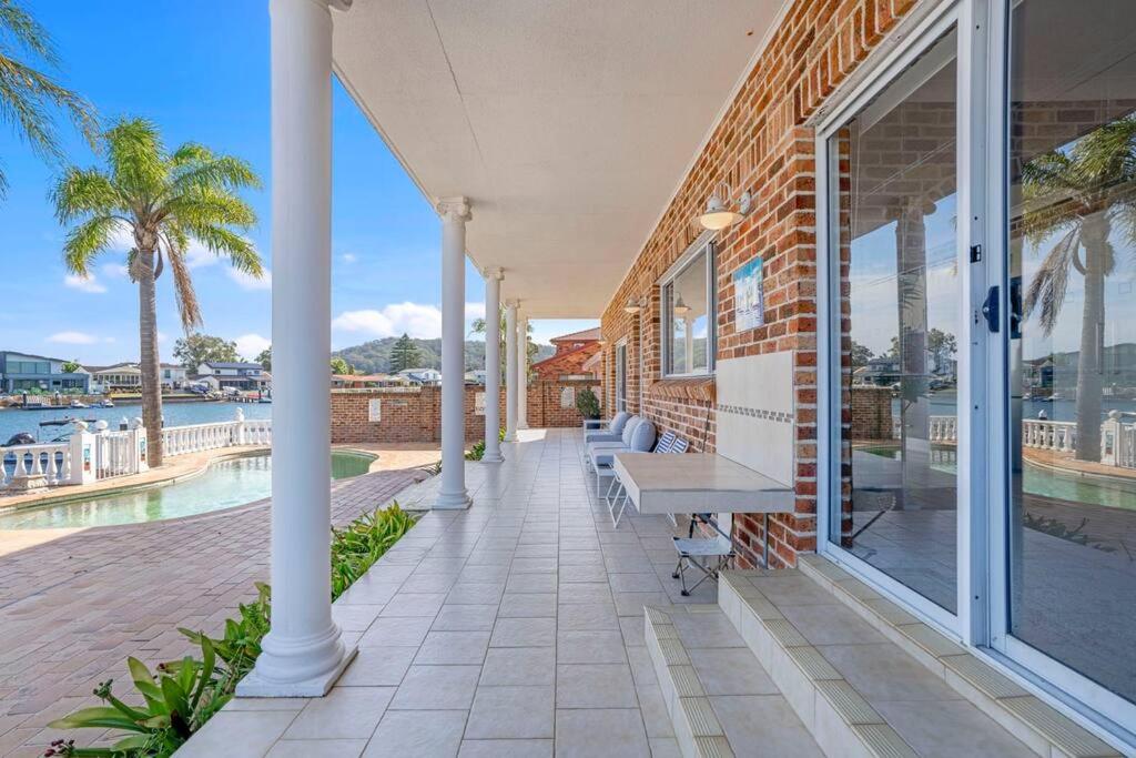 Stunning 4BR Holiday Home with Water Views & Pool