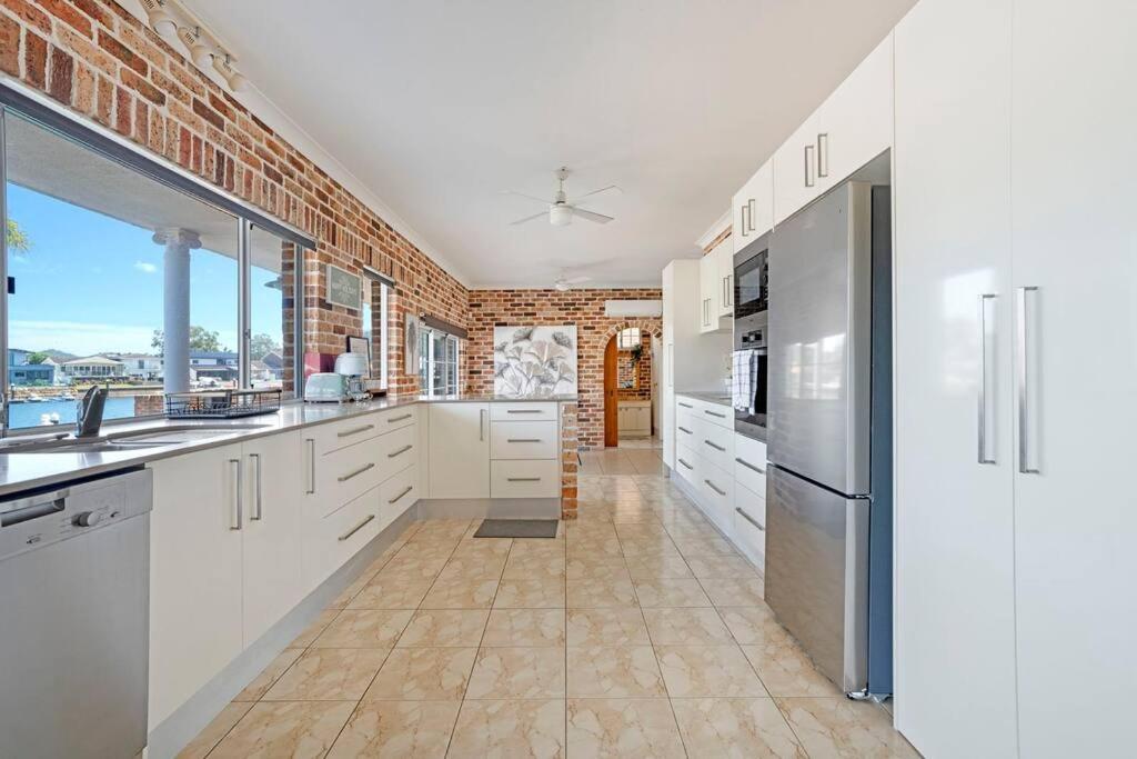 Stunning 4BR Holiday Home with Water Views & Pool
