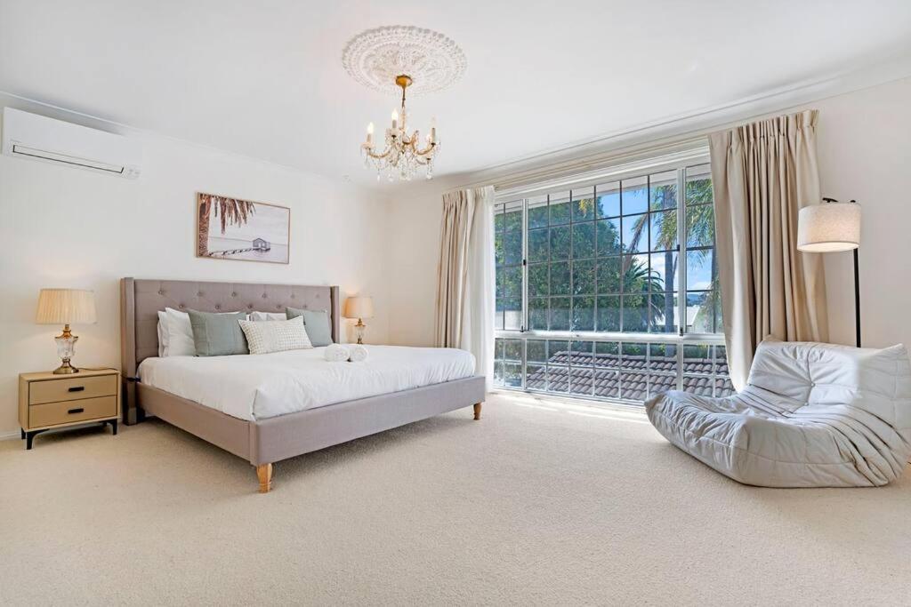 Stunning 4BR Holiday Home with Water Views & Pool