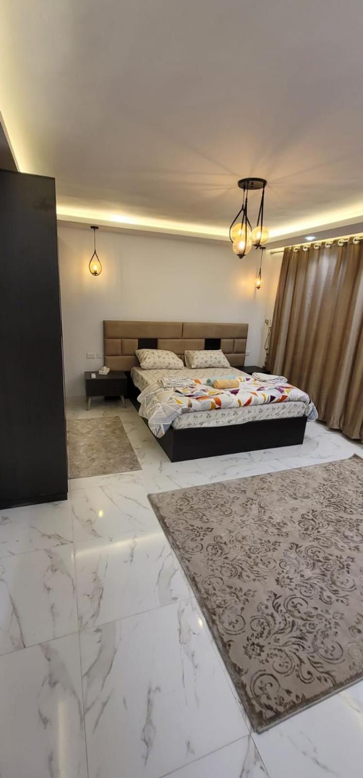 Spacious apartment with beautiful garden near AUC & point 90 mall in fifth settlement