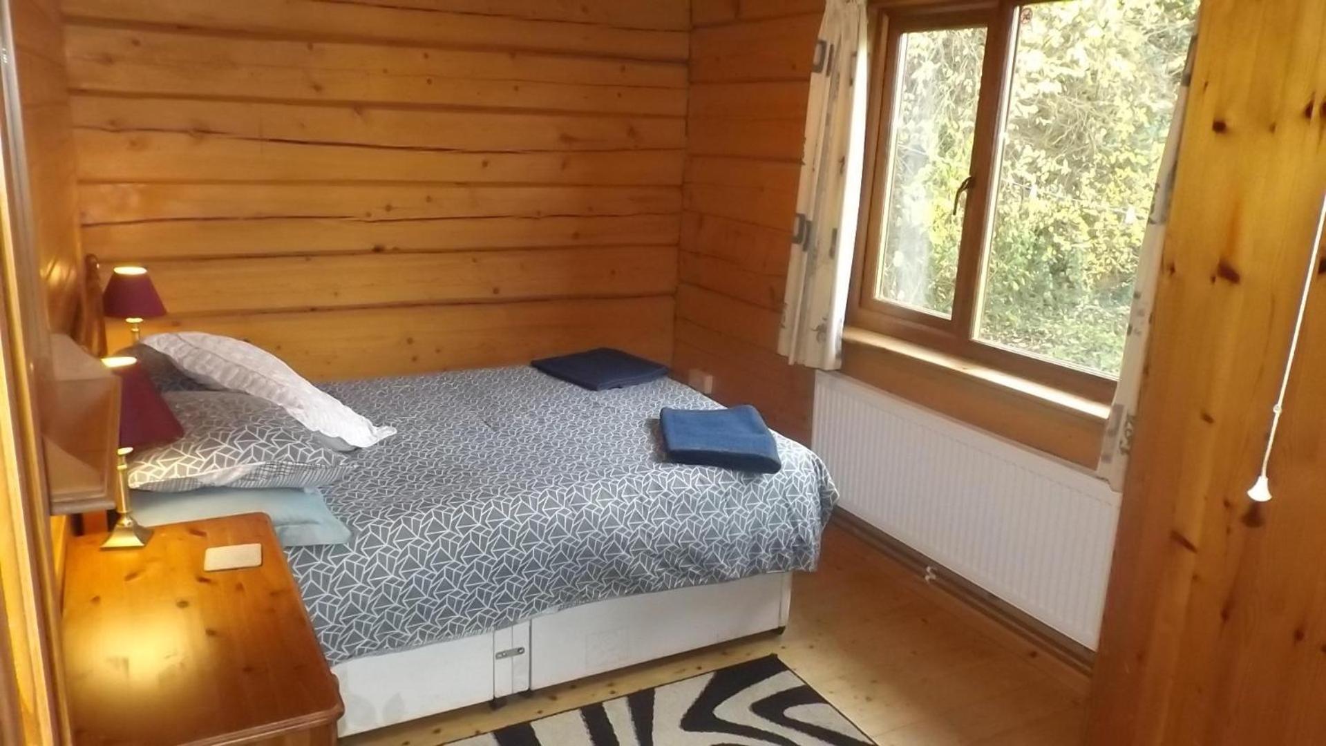 Hand built log cabin at Avonvale Holiday Lodges