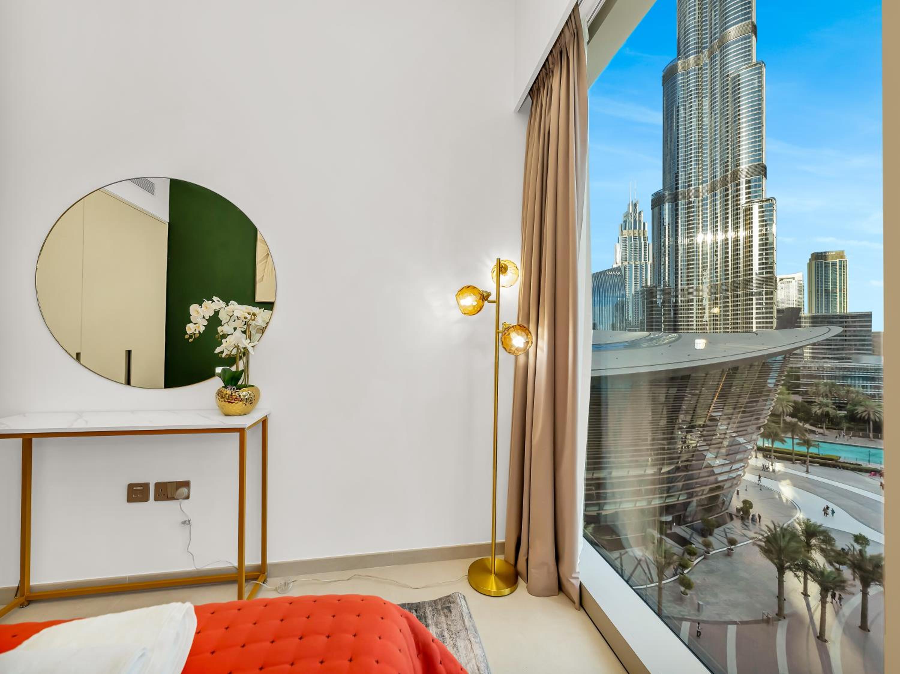 Luxury Two Bedroom Apartment with Balcony, Full Burj Khalifa & Fountain Views by Delujo Stays