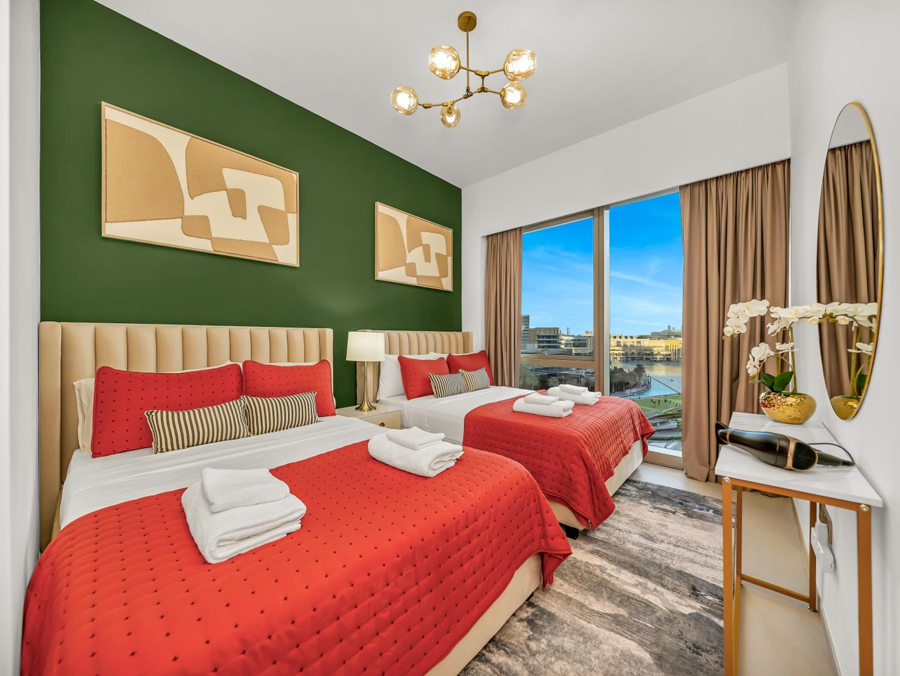 Luxury Two Bedroom Apartment with Balcony, Full Burj Khalifa & Fountain Views by Delujo Stays