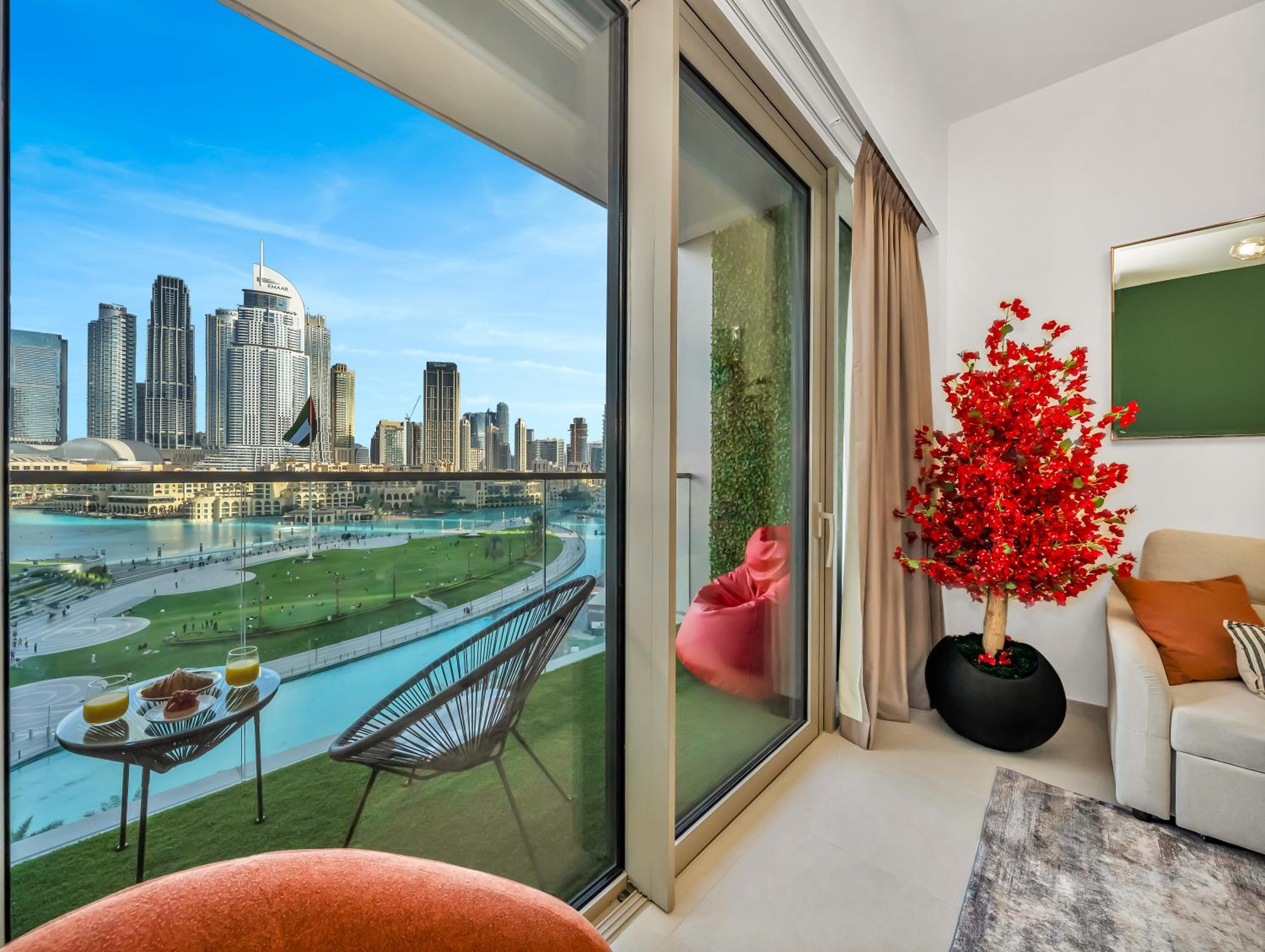 Luxury Two Bedroom Apartment with Balcony, Full Burj Khalifa & Fountain Views by Delujo Stays