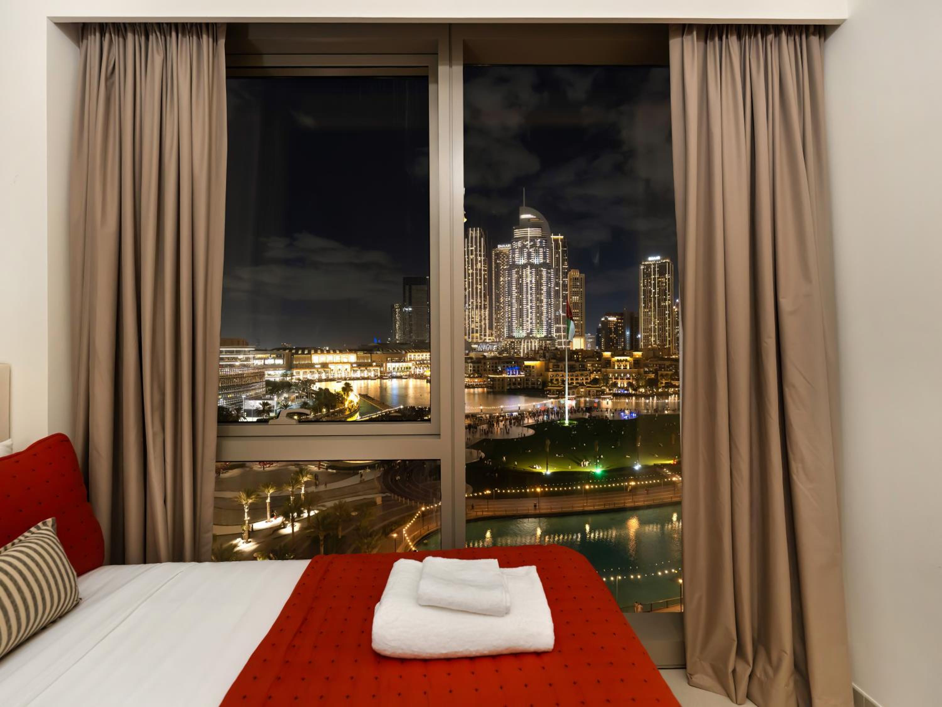 Luxury Two Bedroom Apartment with Balcony, Full Burj Khalifa & Fountain Views by Delujo Stays