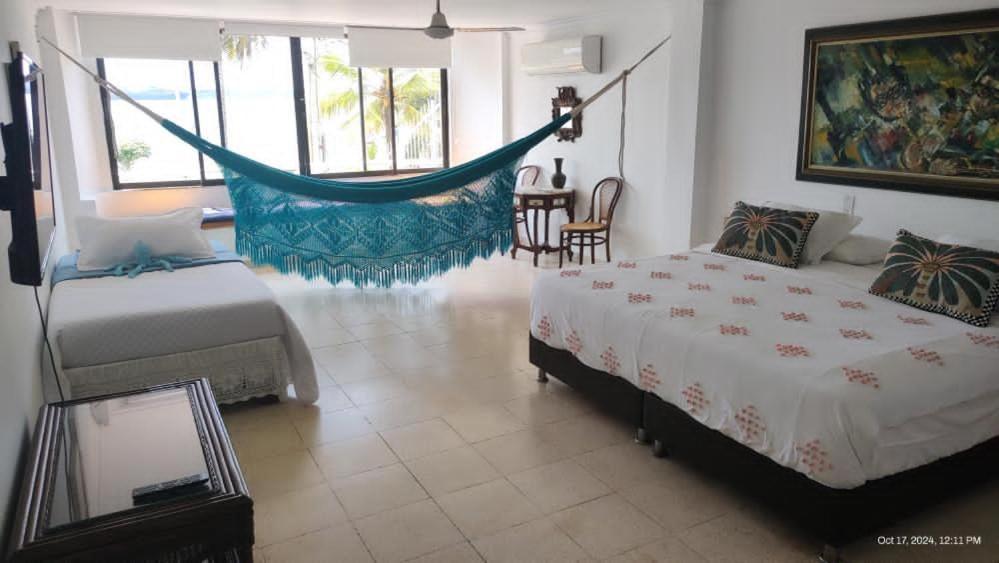 Habitación de lujo en hermosa casa frente al mar