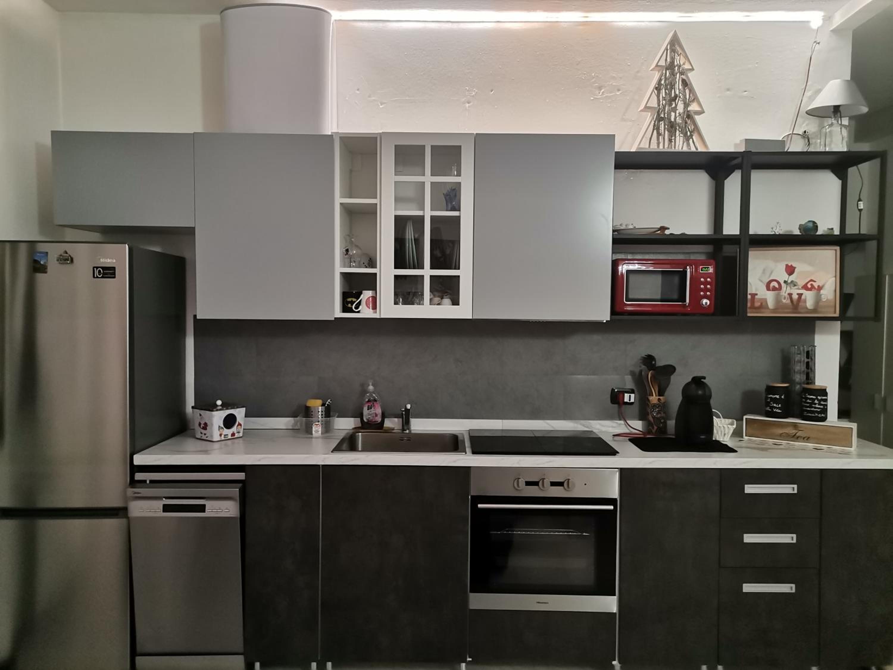 La casa del Cuore en Como — kitchen