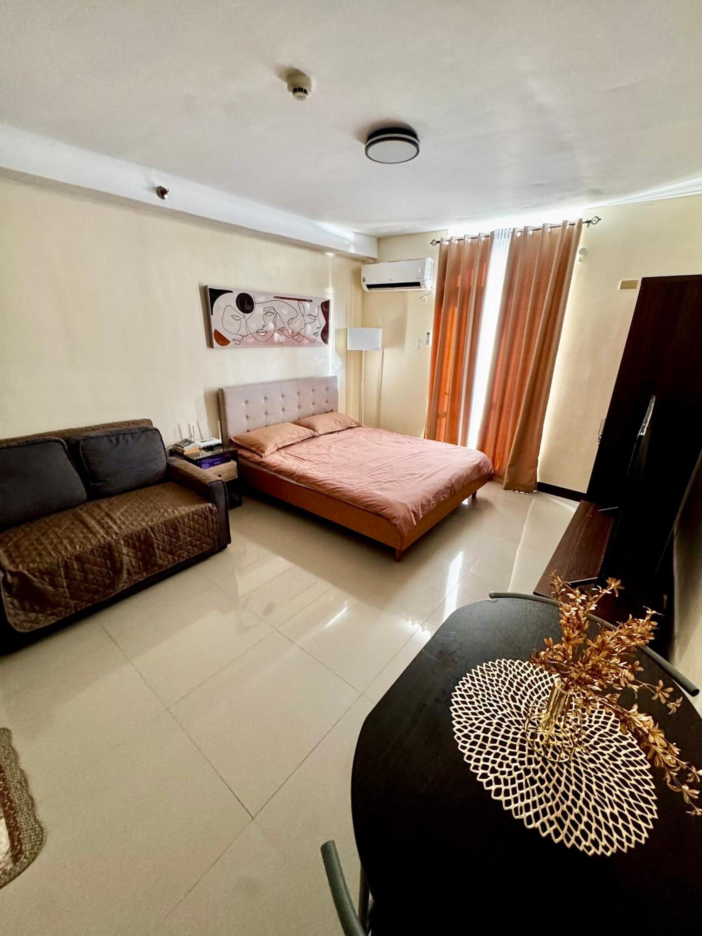 Spacious Condo Unit with Balcony view 5