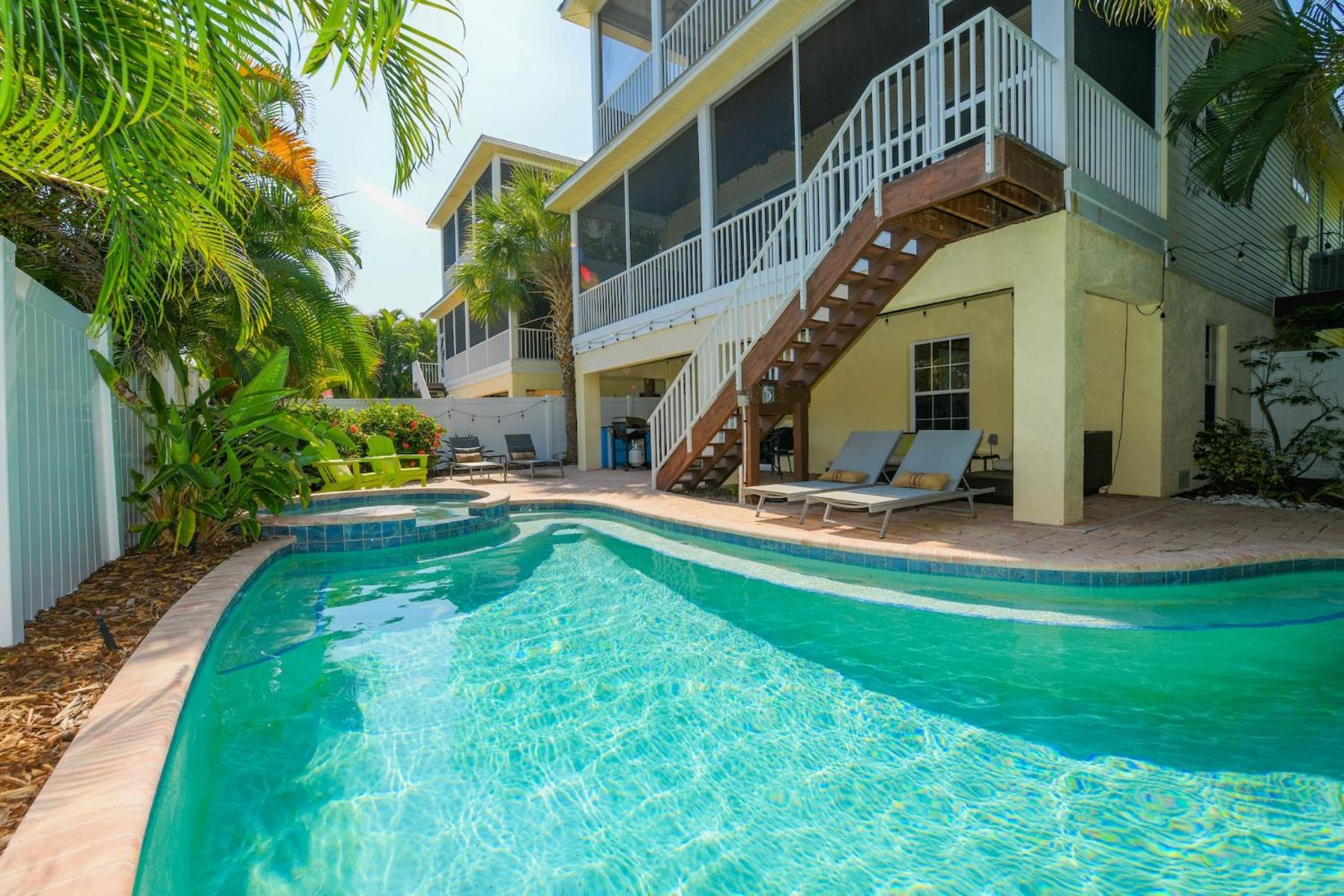 Mango Bay - Gorgeously Renovated Spacious Home wPool Spa Game Room Bikes Walk to Beach view 3