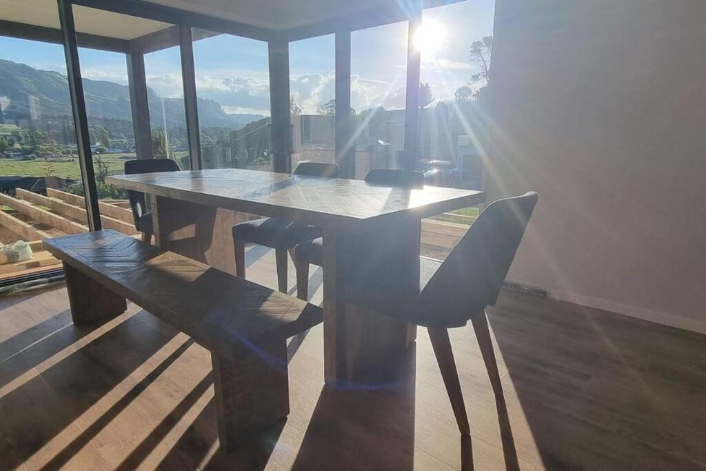 Modern Hilltop Retreat with Mountain Views view 5