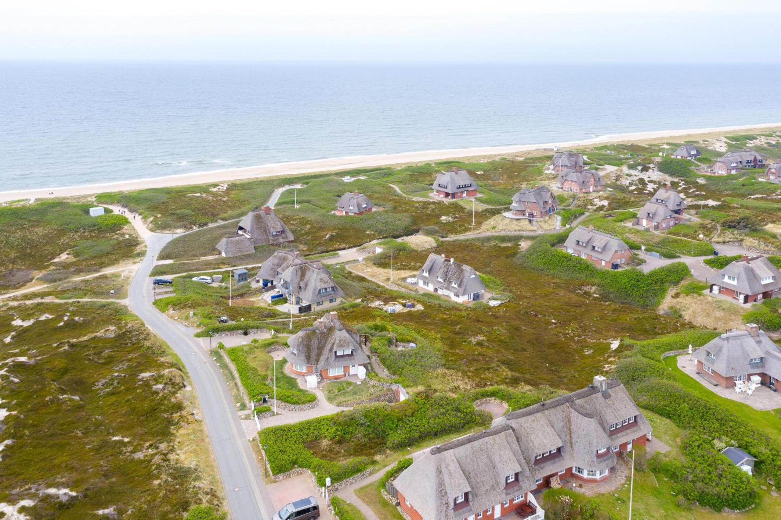 Ferienhaus Seehaus Sylt - Urlaubszauber in den Dünen mit fantastischem Meerblick