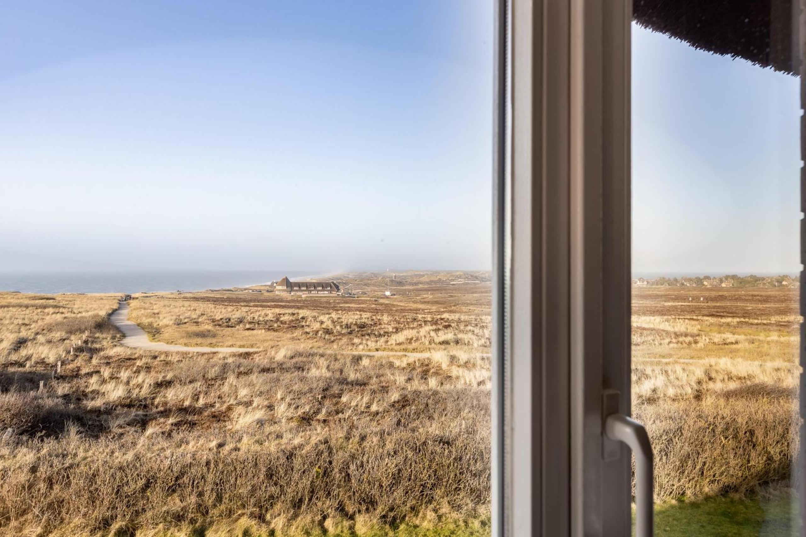 Ferienwohnung Kliffsand 17 urlauben unter Reet mit Meerblick in Kampen, Sylt