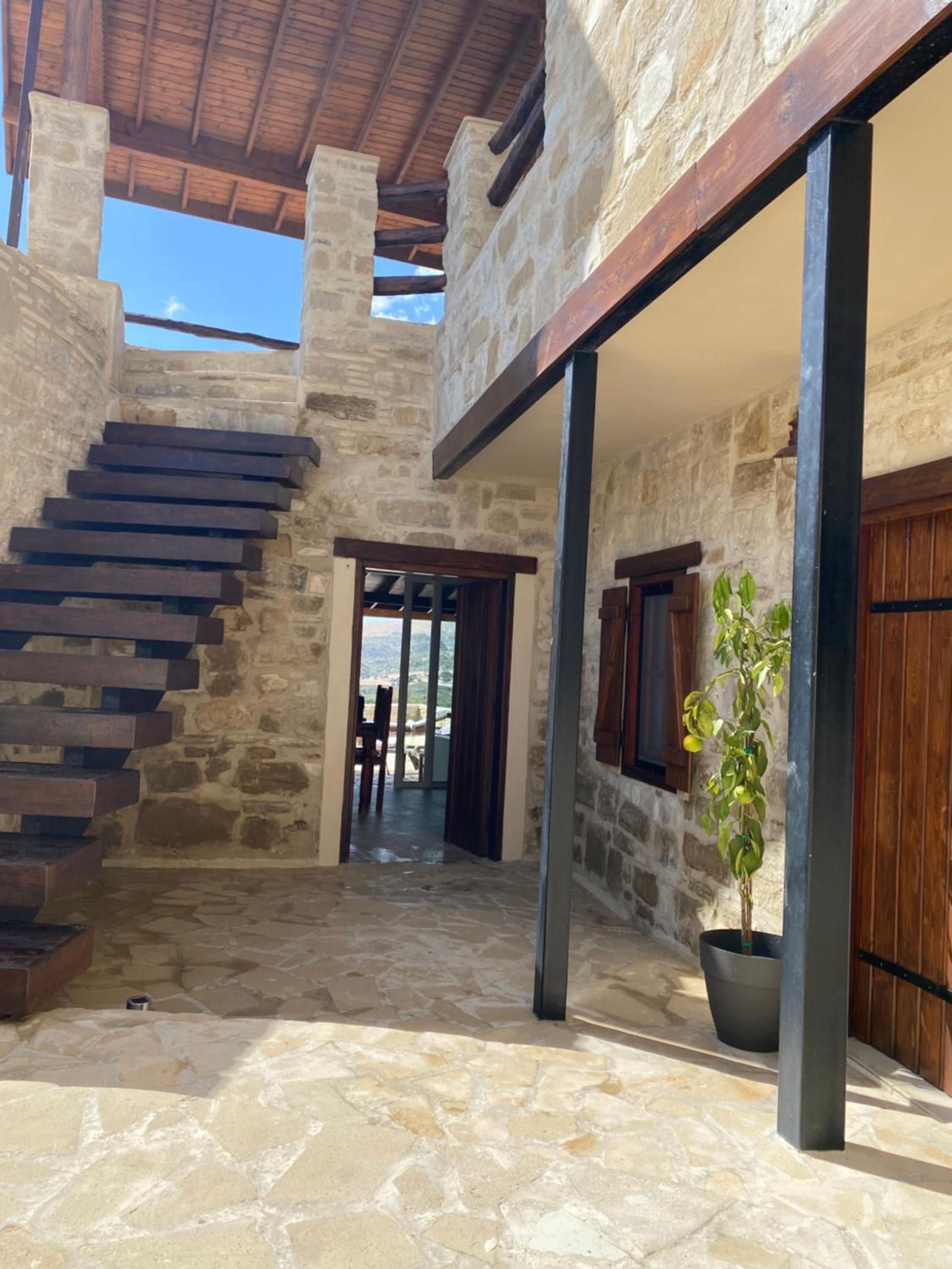 Mountain View Traditional Stone Village Home