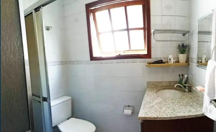 Casa em condomínio de frente ao mar