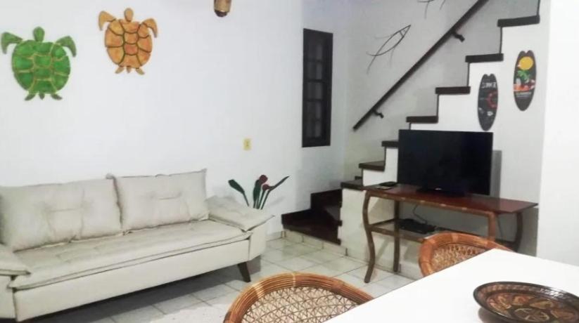 Casa em condomínio de frente ao mar