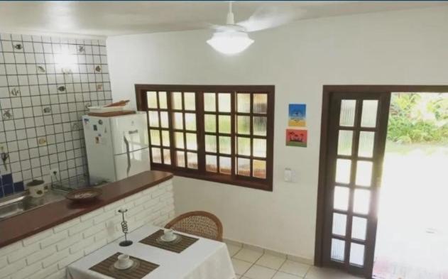 Casa em condomínio de frente ao mar