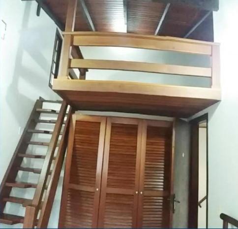 Casa em condomínio de frente ao mar