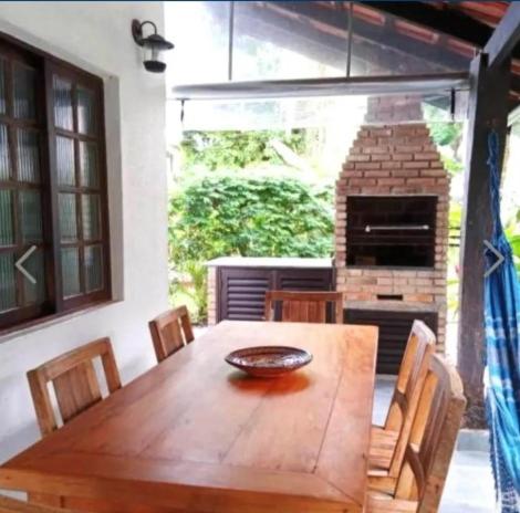 Casa em condomínio de frente ao mar
