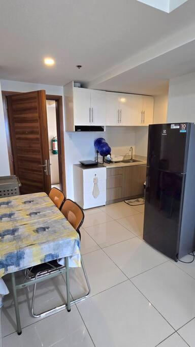 1BR T2 with Balcony Panoramic View at Horizons 101 view 5