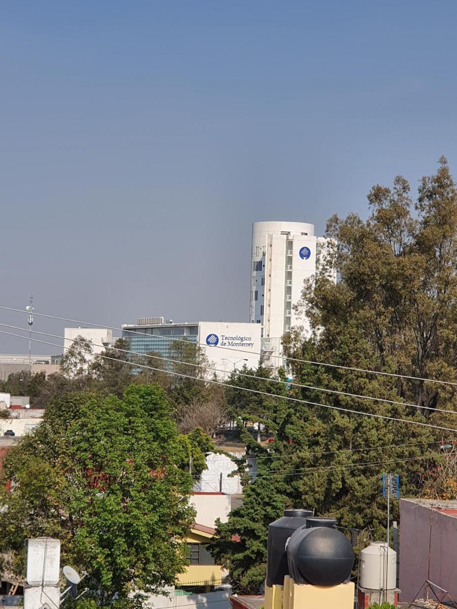 S09 SUITE KING Premium Suite TEC CEM Cocineta WiFi Balcón Parking Terraza view 5