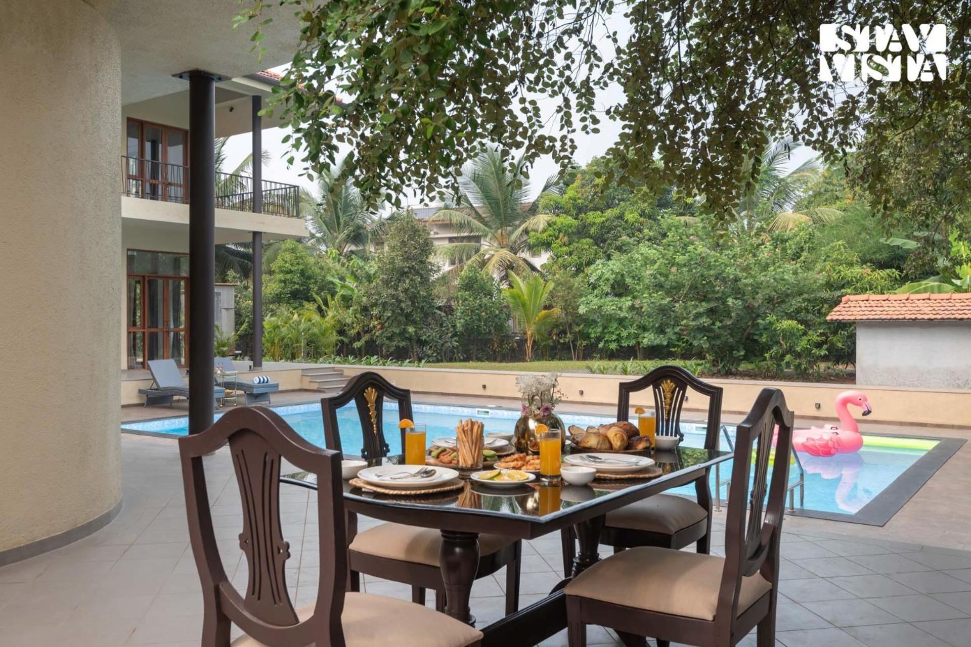 StayVista at Casa Frangipani - Lawn & BBQ view 5