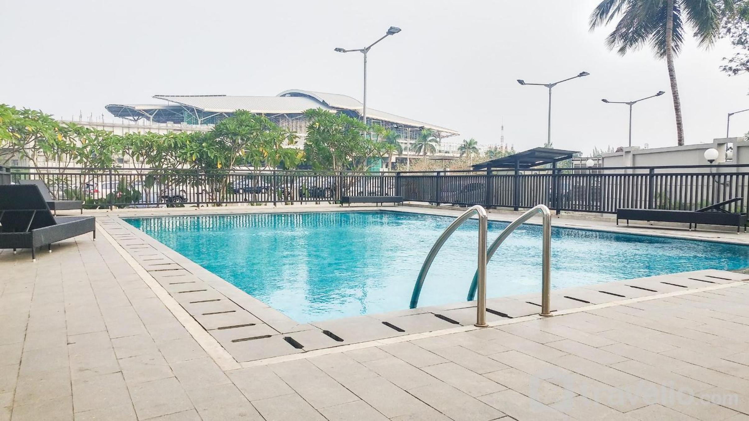 Homey and Comfort Studio at Tifolia Apartment By Travelio