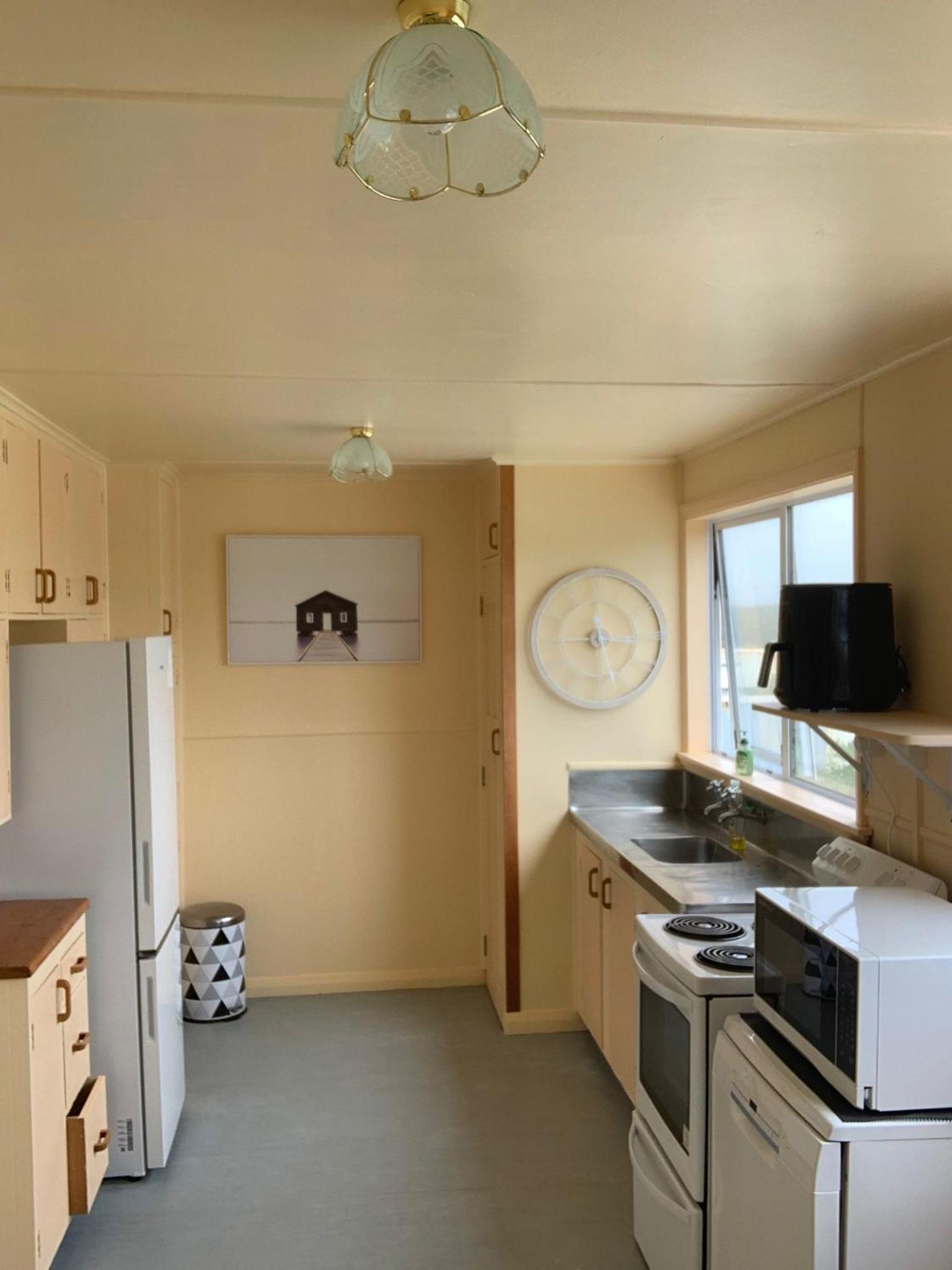 Foxton Beach Bach 5 Star Location 2 Min Walk To Beach New Furnishings BBQ view 4
