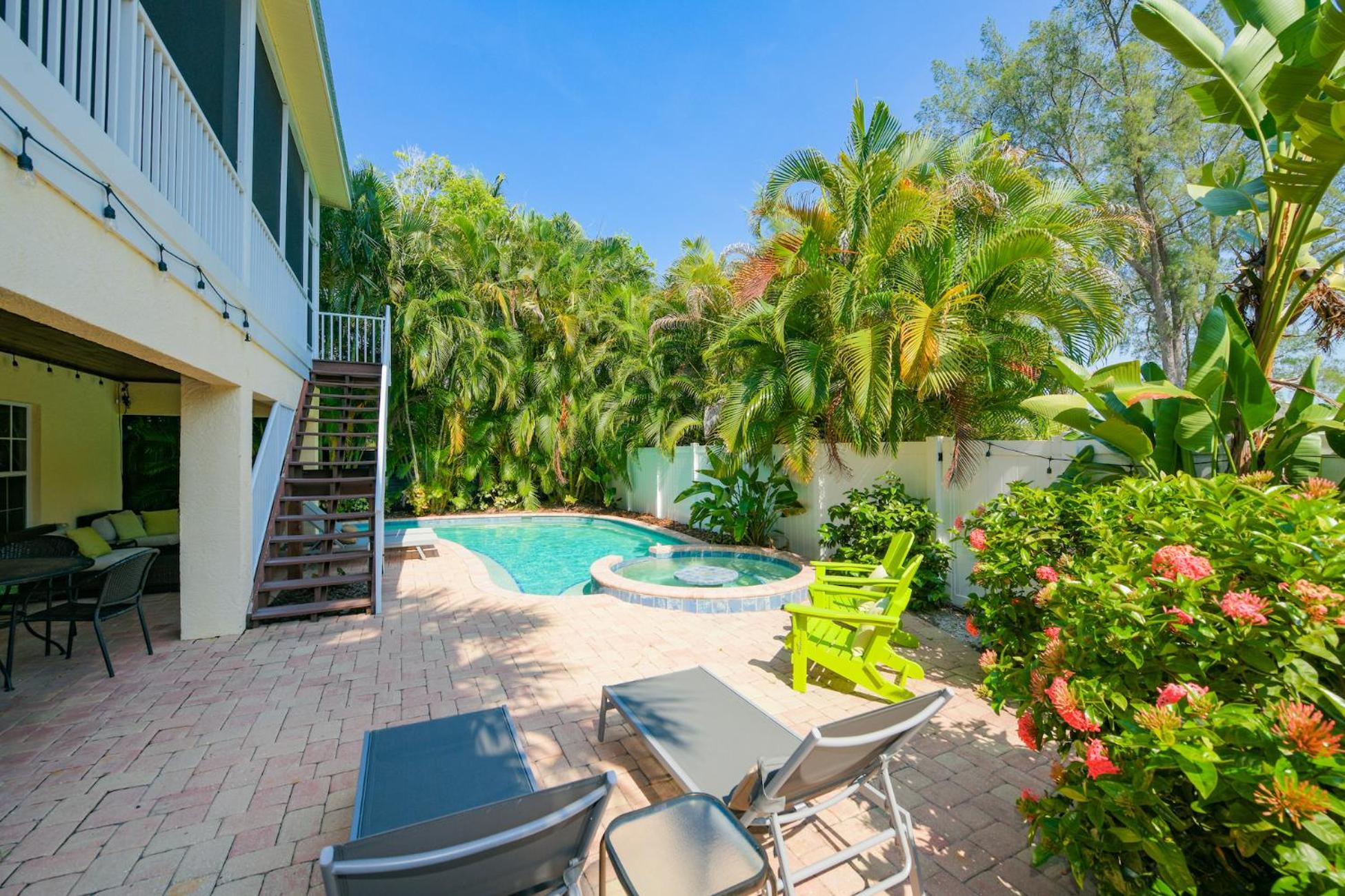 Mango Bay - Gorgeously Renovated Spacious Home wPool Spa Game Room Bikes Walk to Beach view 5