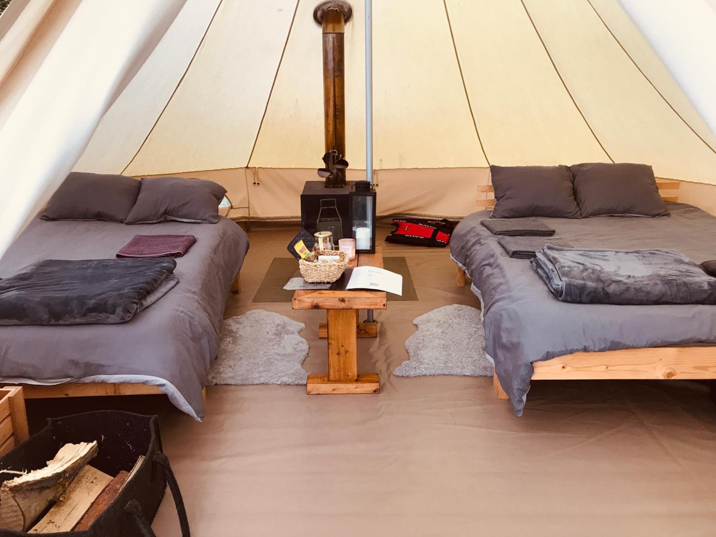 Glamping tent in a forest, lake view view 4