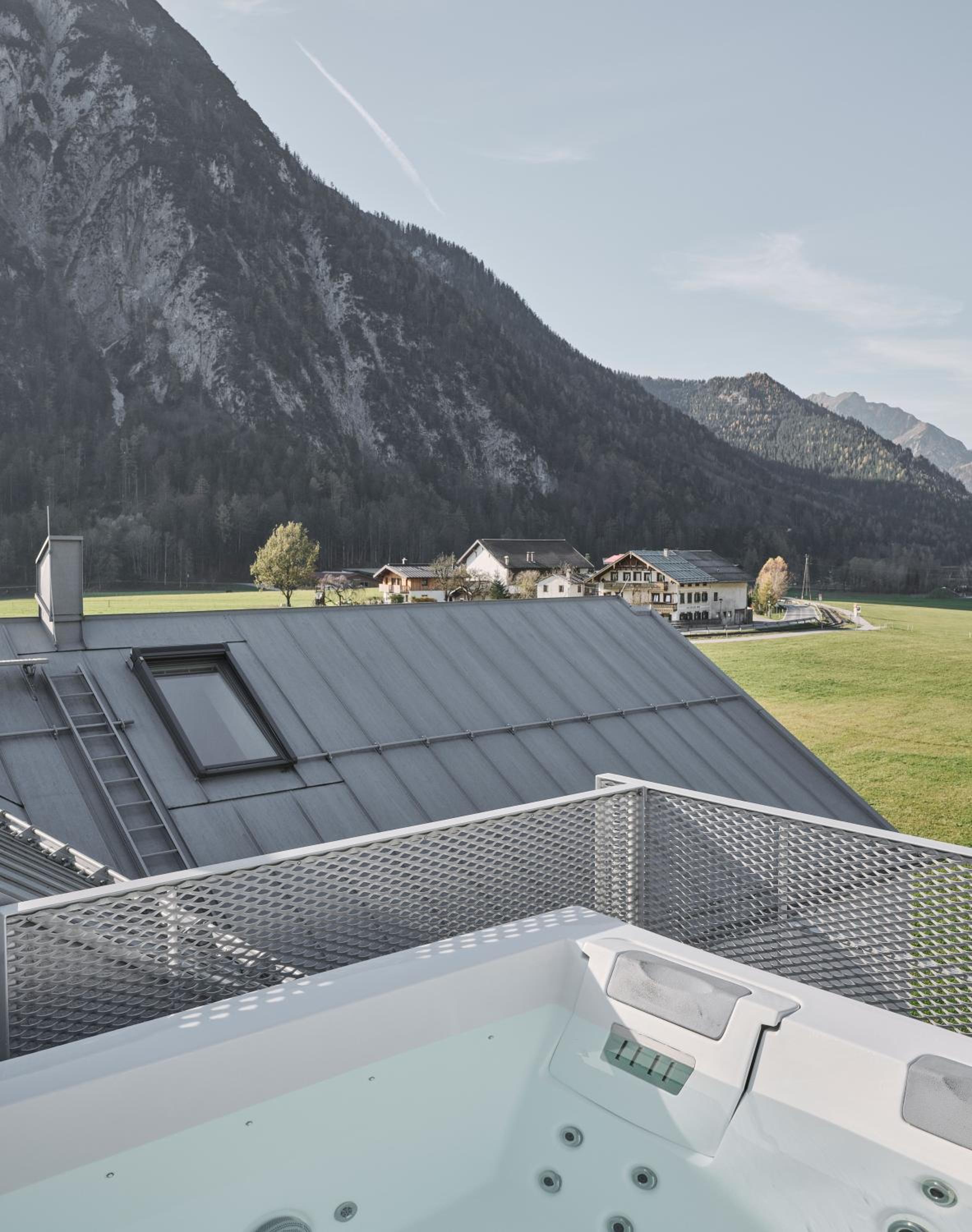 Modern Alpine Penthouse with Lake View