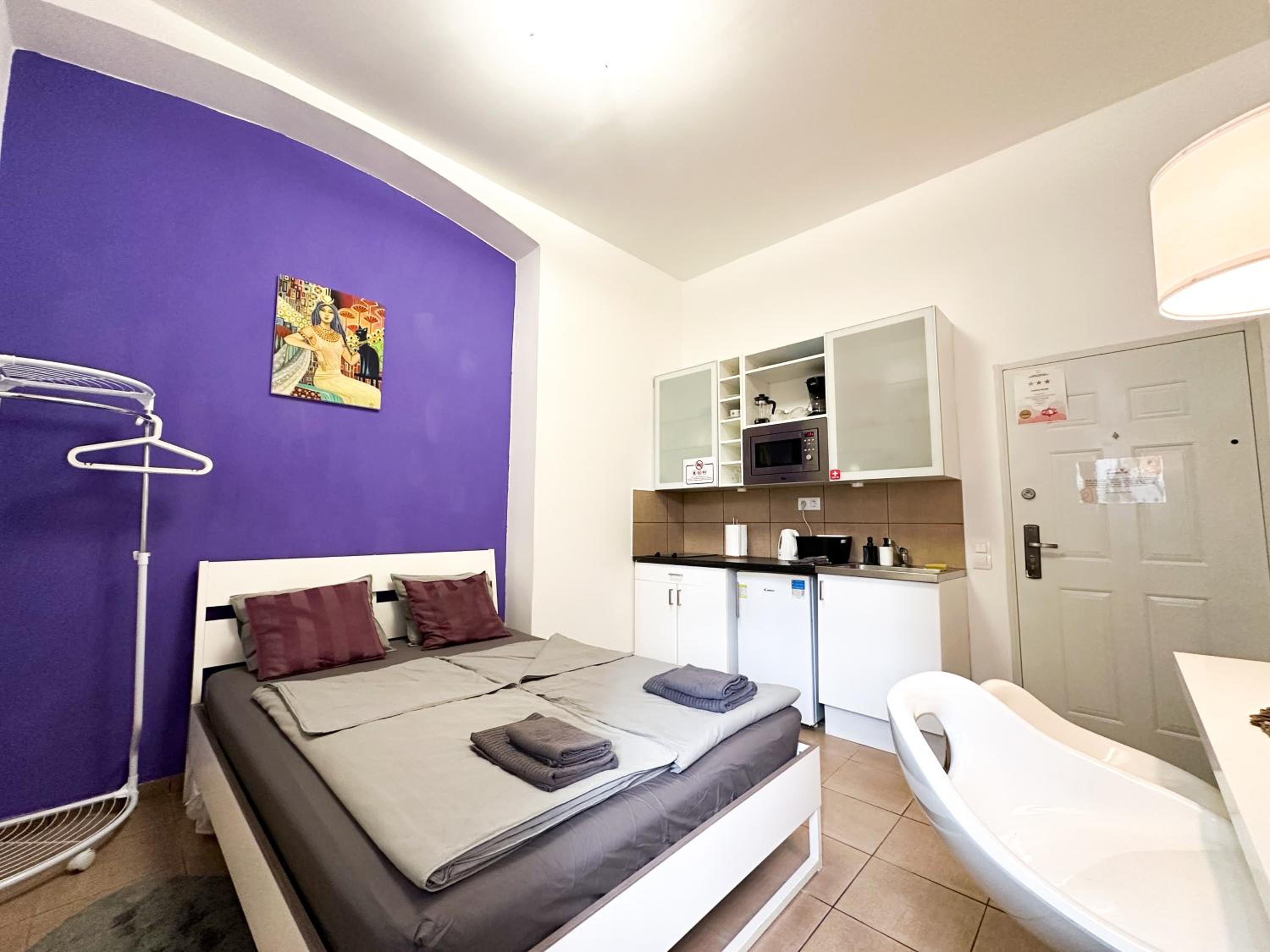 Cozy Central Studio AC- Purple Room view 3