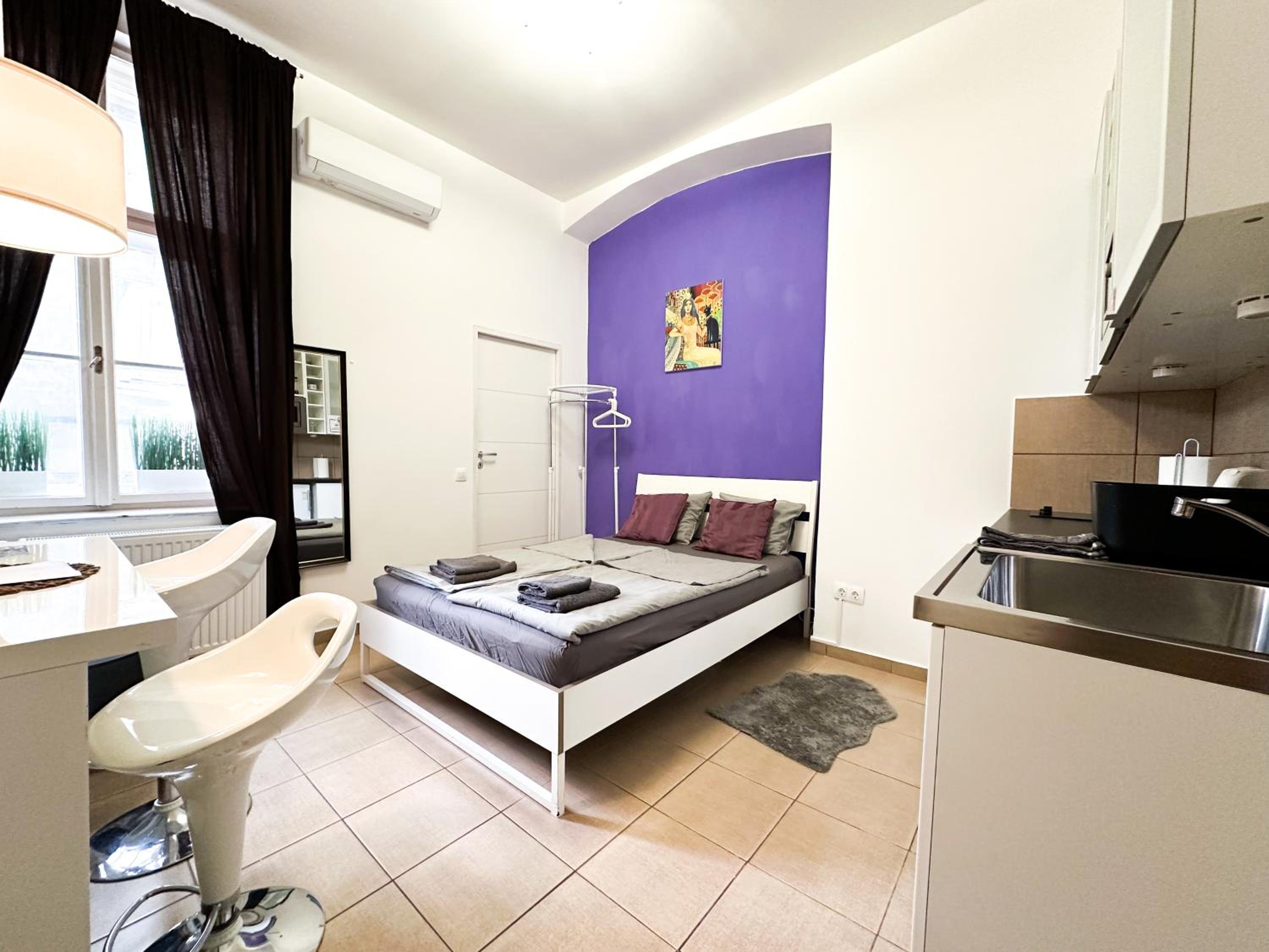 Cozy Central Studio AC- Purple Room view 2