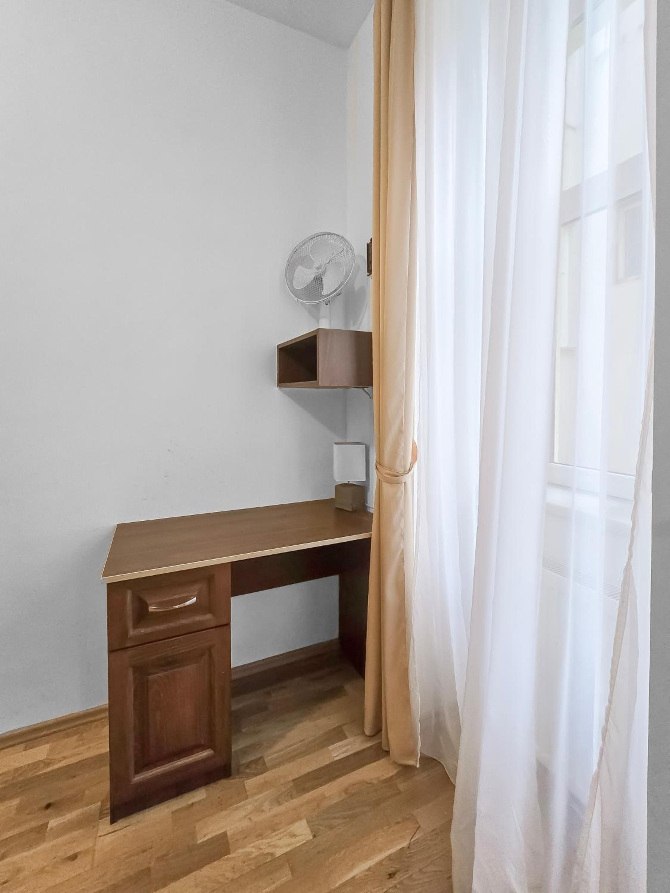 Two-Bedroom Balcony Retreat for 4 Near Millennium Tower